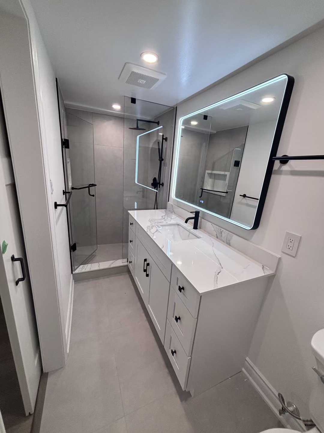 black frame LED mirror with custom shower glass