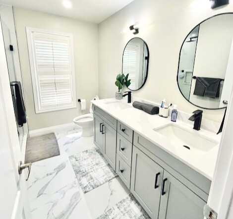White design bathroom, Track Shape Mirror, Stand alone bathtub.