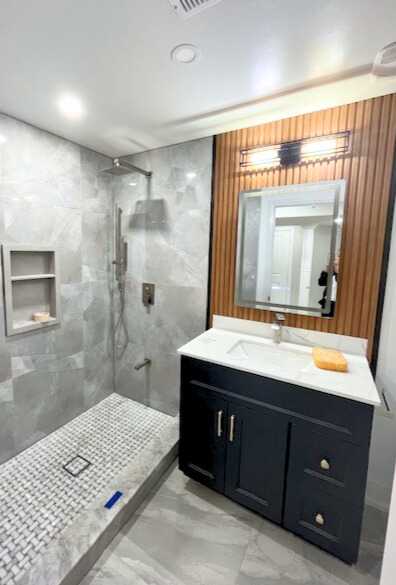 White design bathroom, Track Shape Mirror, Stand alone bathtub.