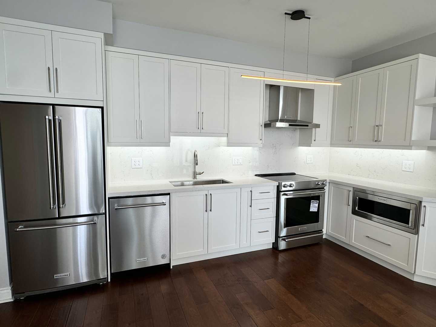 2 bathroom with white shaker kitchen cabinet