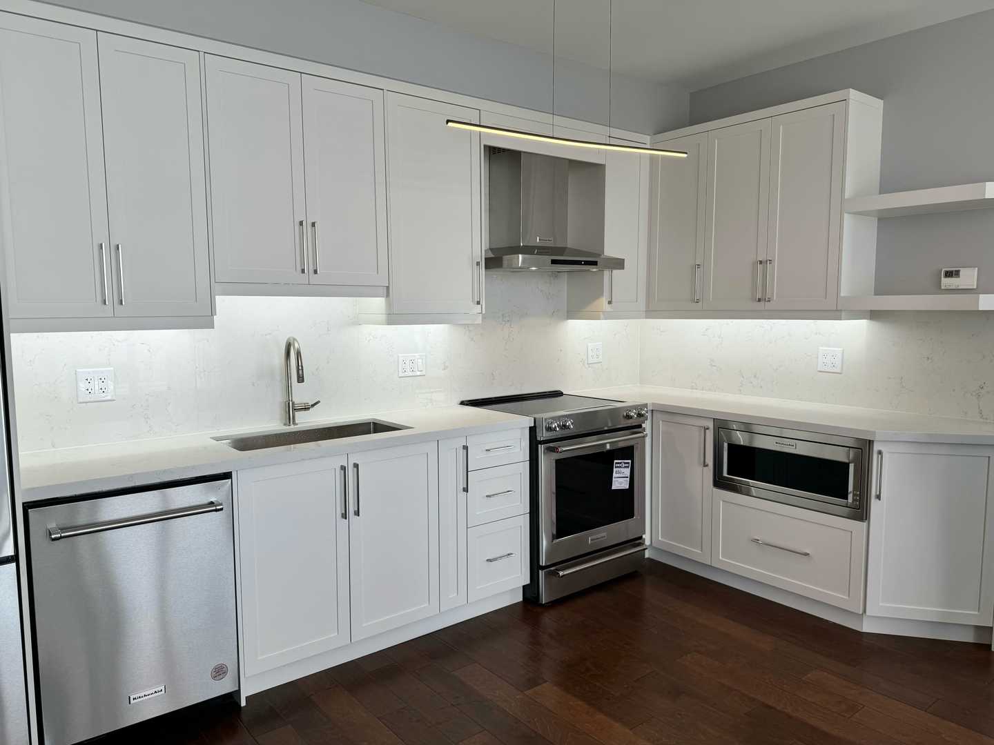 2 bathroom with white shaker kitchen cabinet