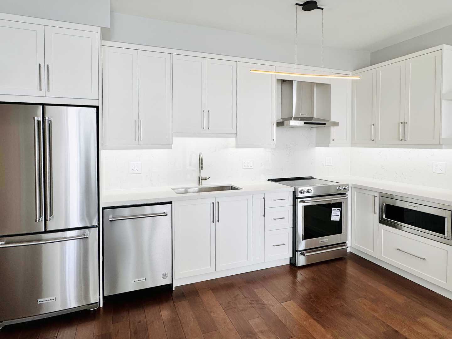 2 bathroom with white shaker kitchen cabinet