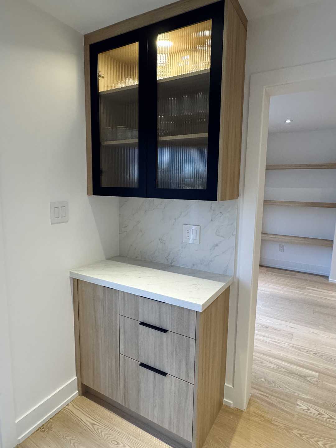 L shape kitchen-Wood panel cabinet with black fluted coffee bar,
