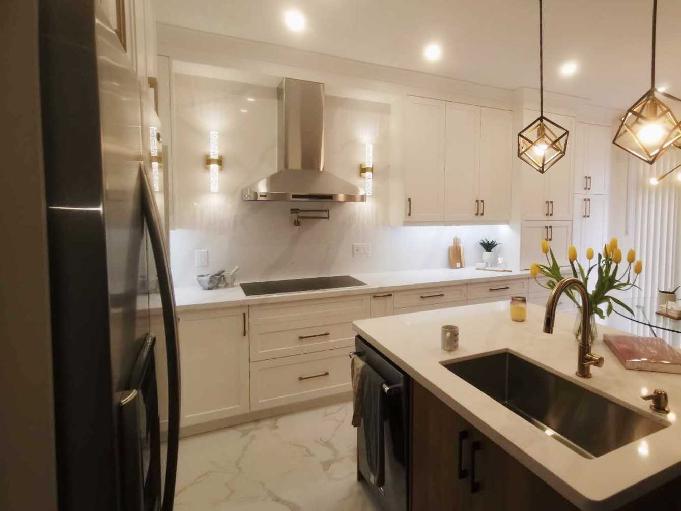 L shaped kitchen- white wood panel cabinet with dark wood
