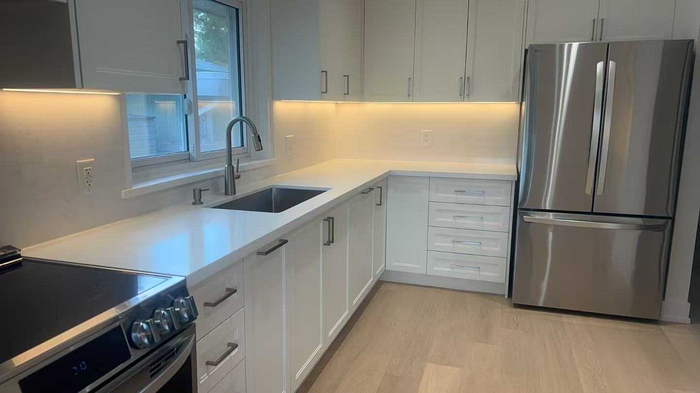 Kitchen reno all white with brushed nickel fixtures