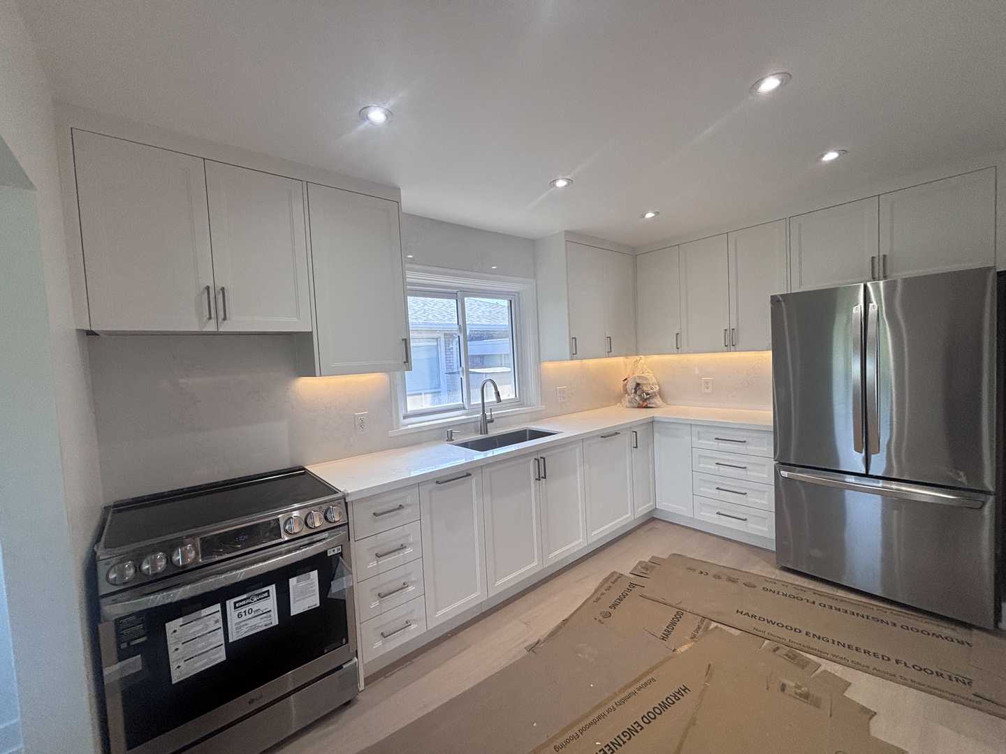 Kitchen reno all white with brushed nickel fixtures