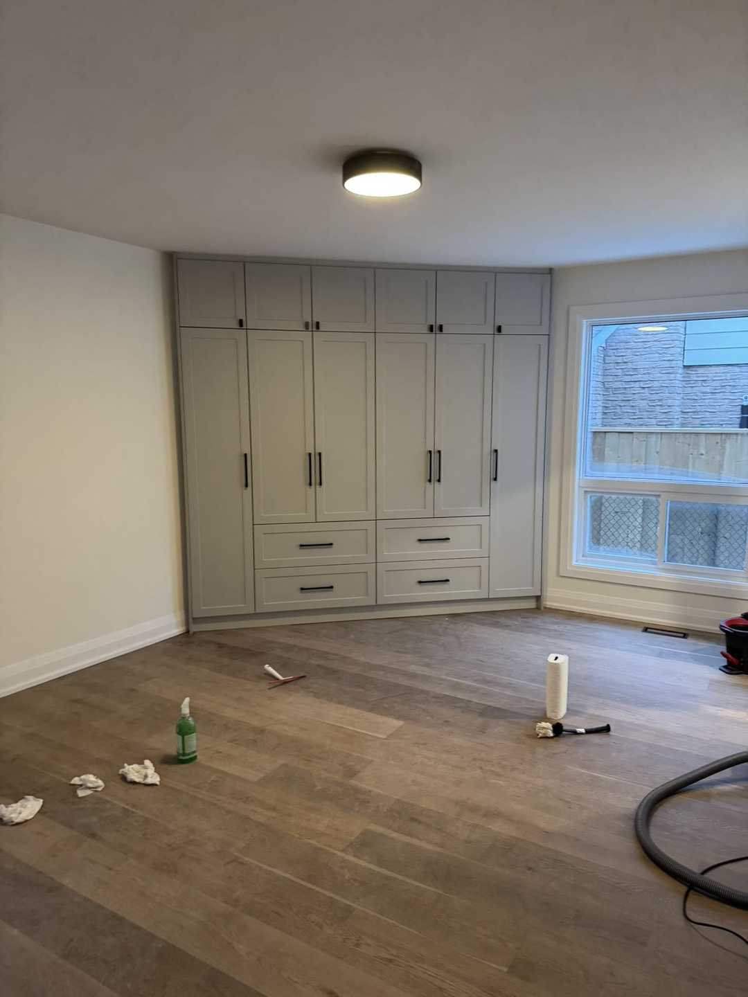 Complete home renovation featuring built-in closets, a kitchen with cabinets