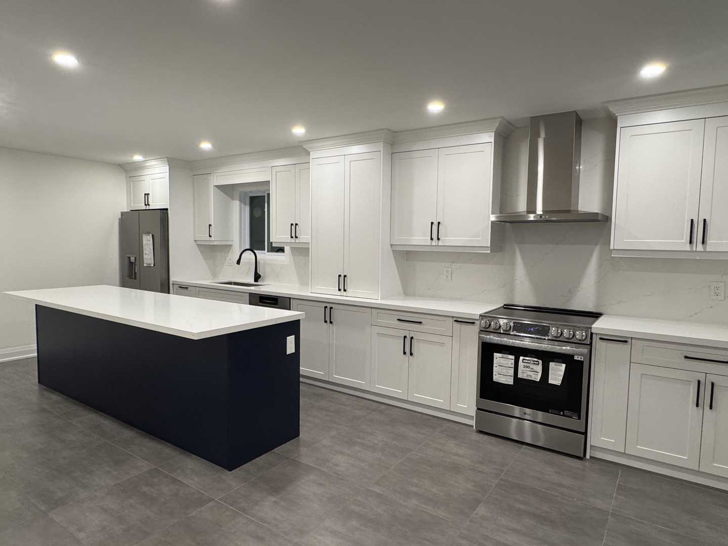 Complete home renovation featuring built-in closets, a kitchen with cabinets