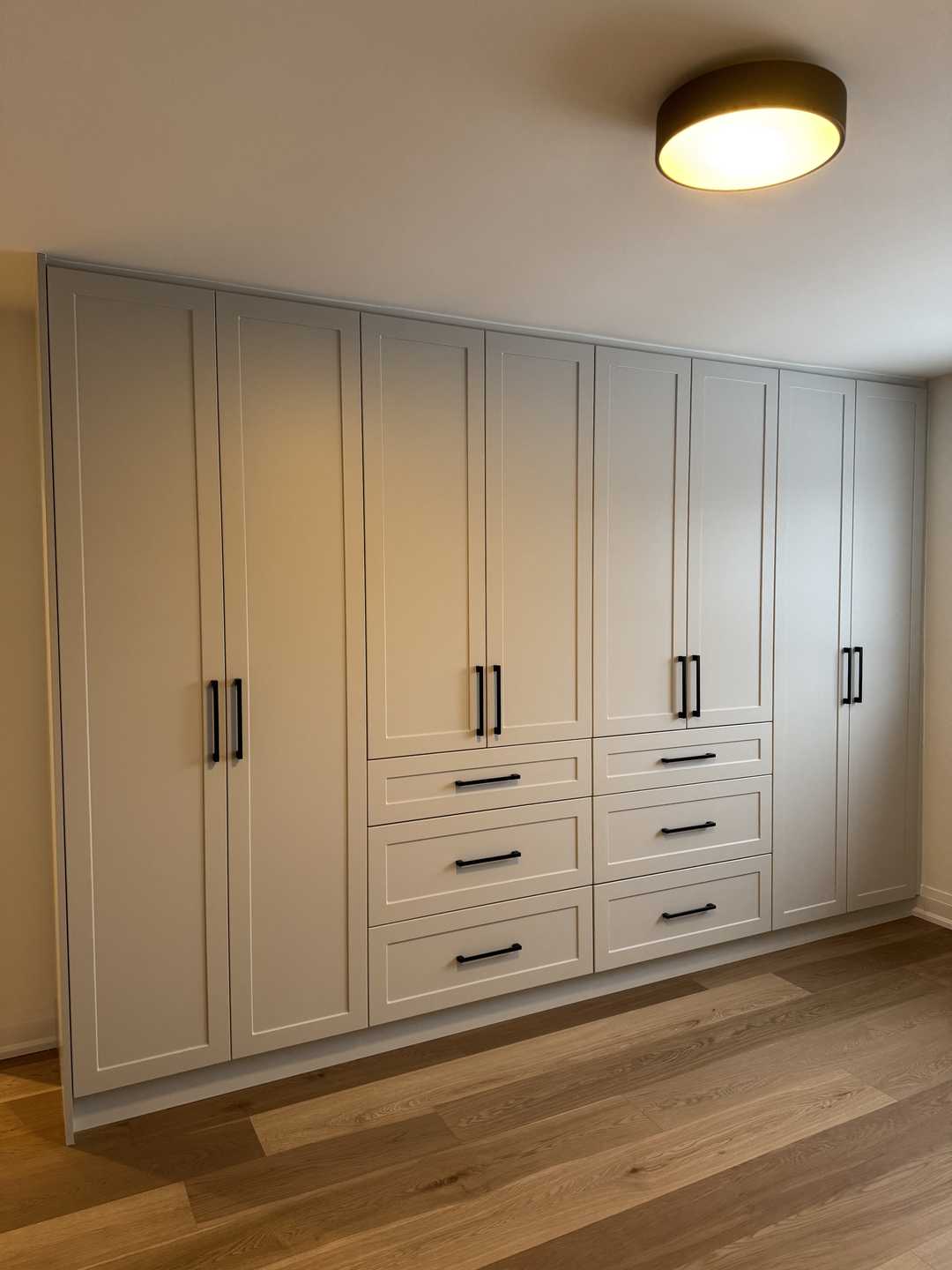 Complete home renovation featuring built-in closets, a kitchen with cabinets