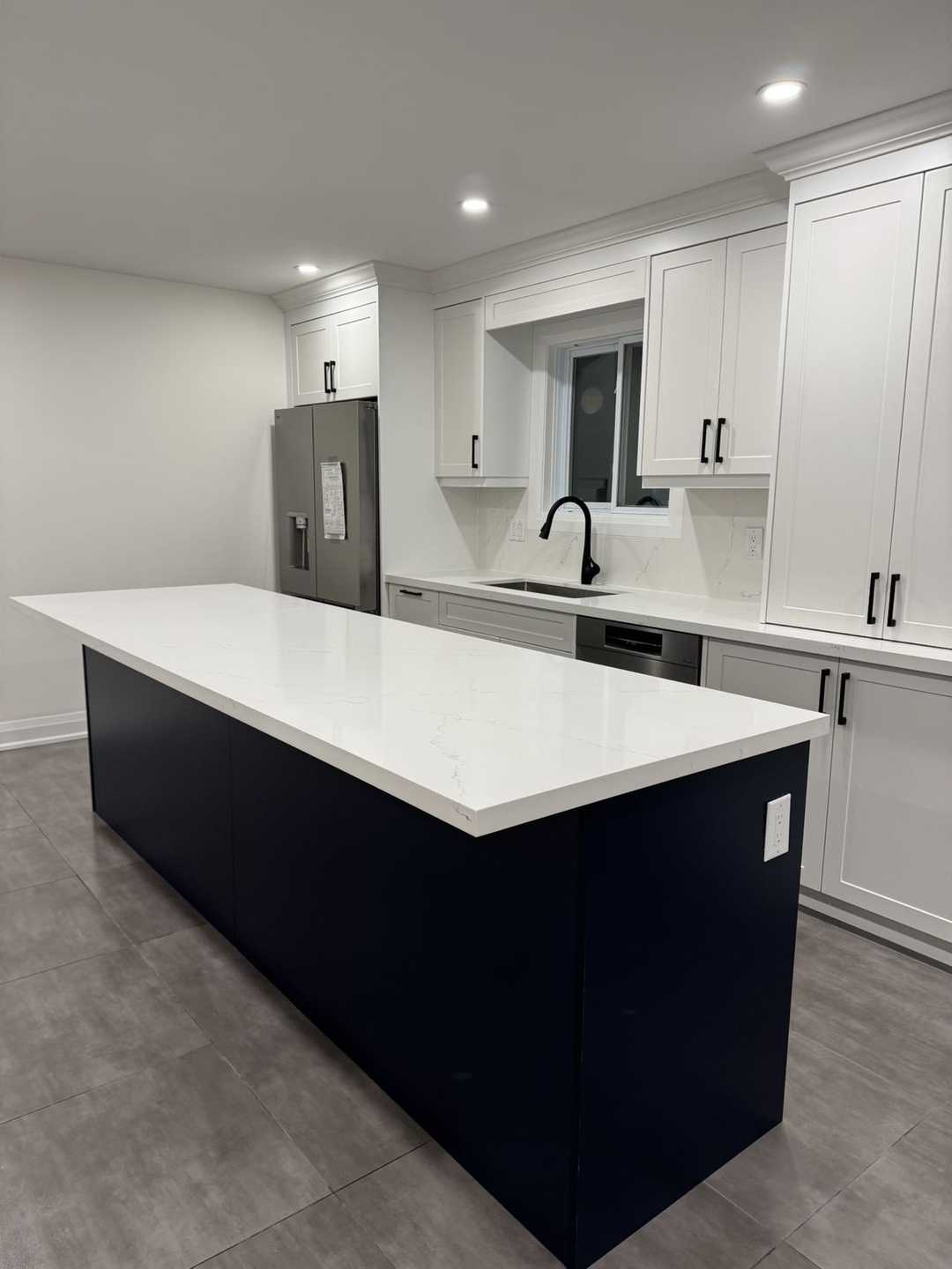 Complete home renovation featuring built-in closets, a kitchen with cabinets