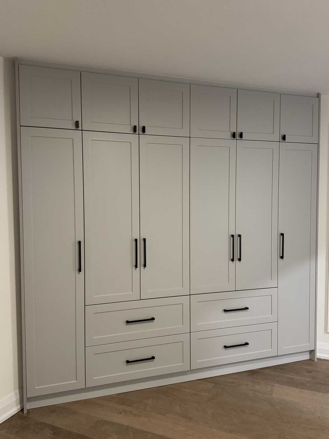 Complete home renovation featuring built-in closets, a kitchen with cabinets