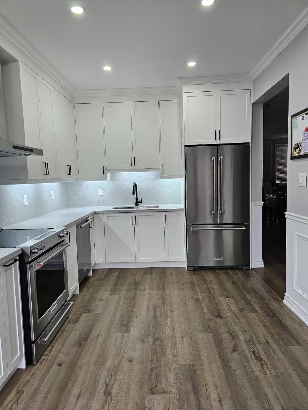 White shaker Built-in customize kitchen cabinets with drawers with brownish