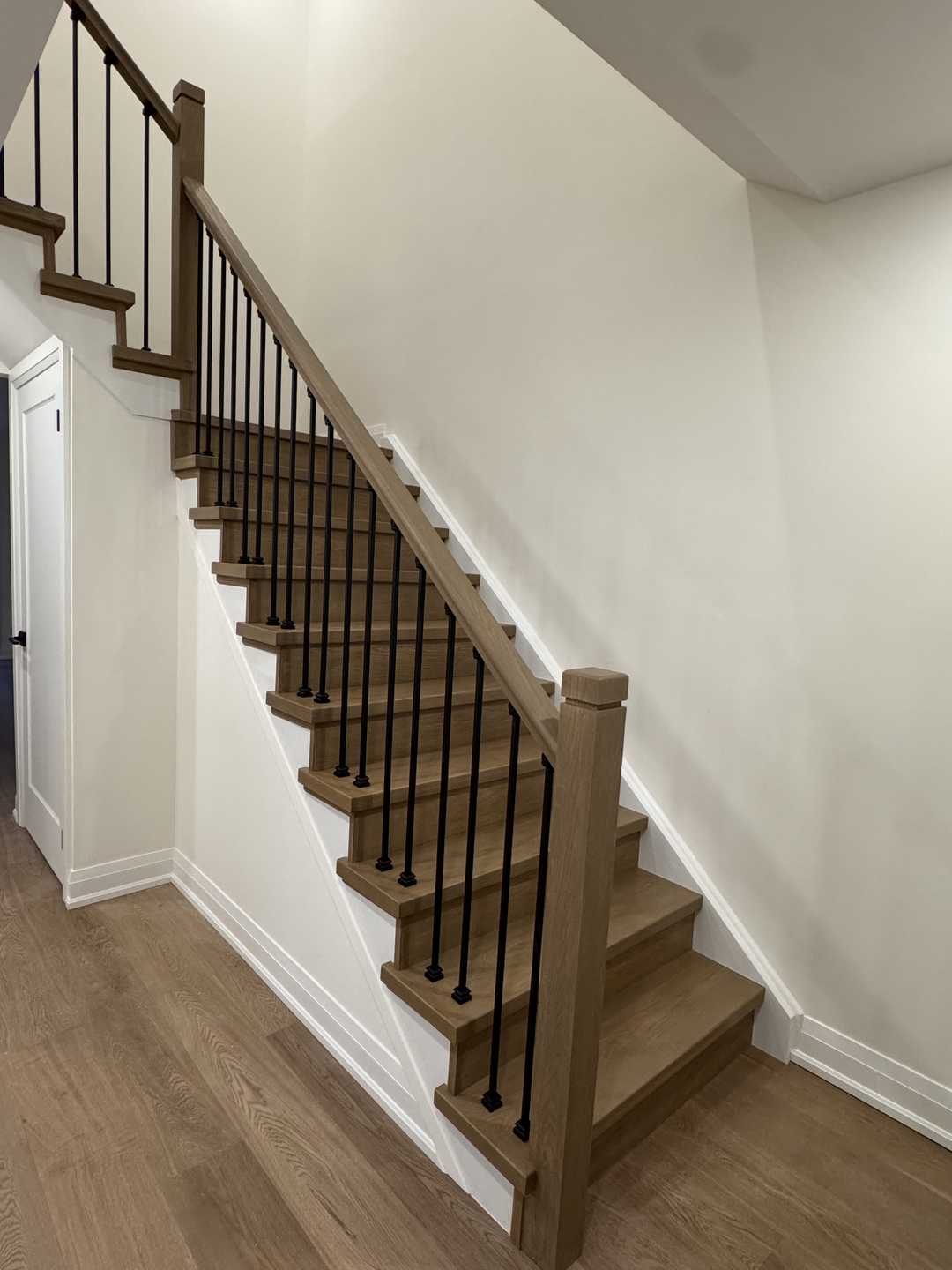 Medium-tone coffee coloured hardwood flooring