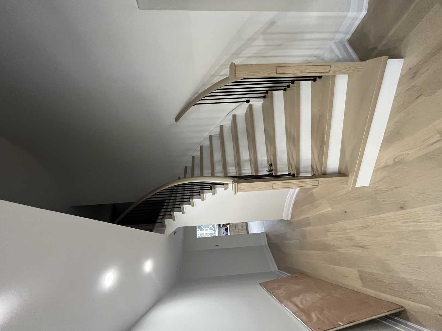 Complete floor renovation throughout the house, including the staircase in